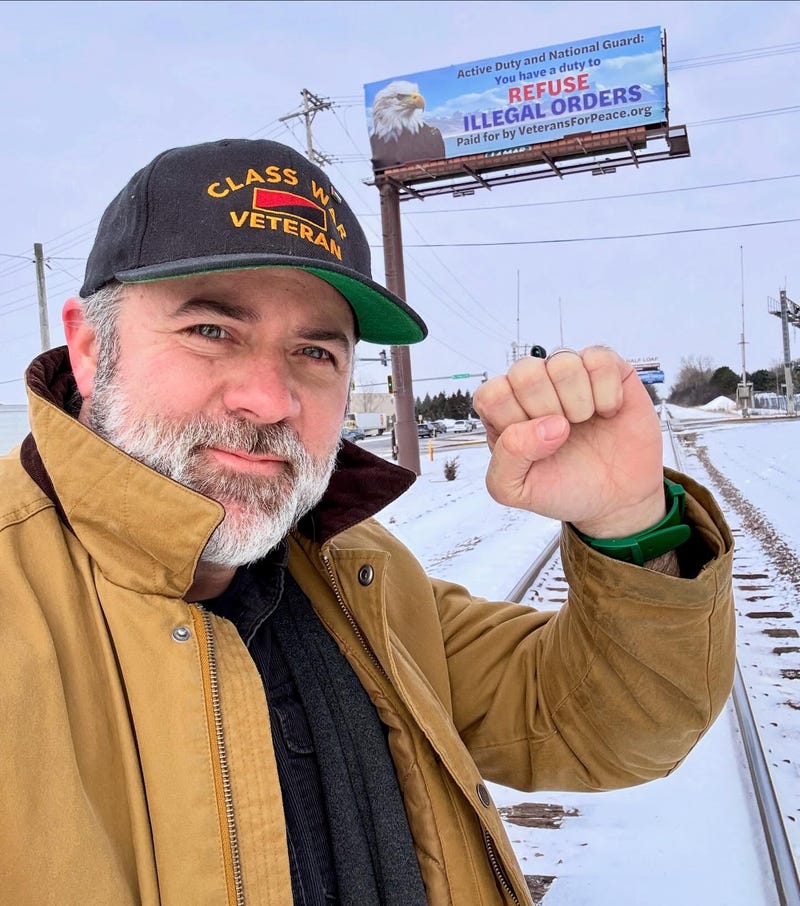 Billboard In Northern Suburbs Has Message For Military 