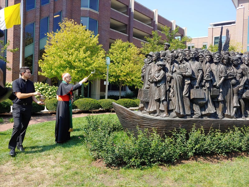 Vatican leader blesses sculpture at Loyola celebrating migrants and refugees