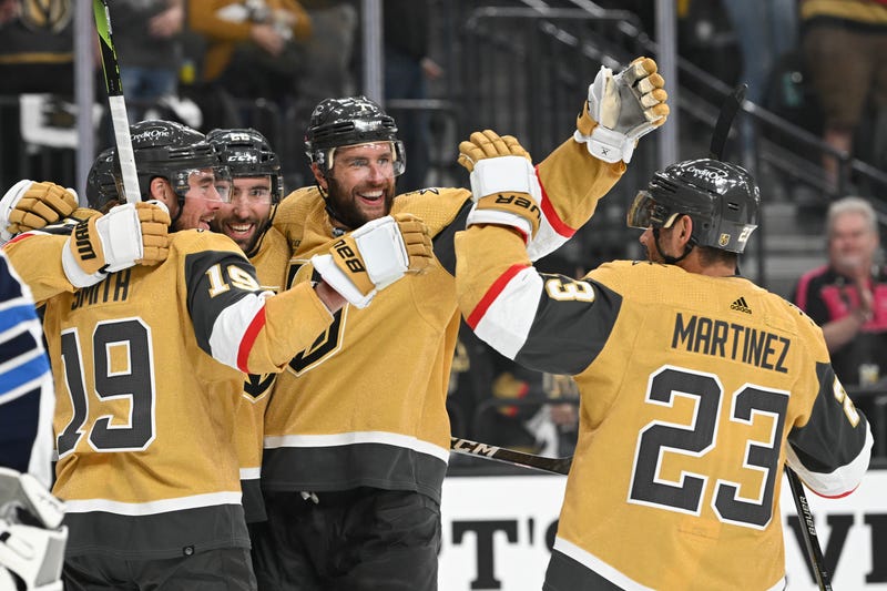 The Vegas Golden Knights celebrate scoring a goal