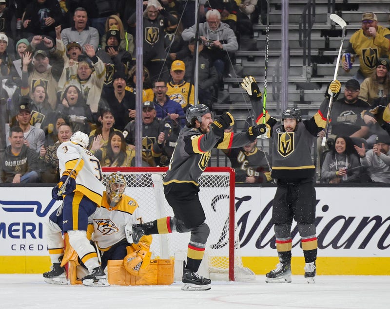 Mark Stone #61 and Chandler Stephenson (R) #20 of the Vegas Golden Knights celebrate after Stone scored a goal against Jeremy Lauzon #3 and Juuse Saros #74 of the Nashville Predators in the first period of their game at T-Mobile Arena on January 15, 2024 