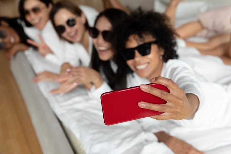 wedding party taking selfies