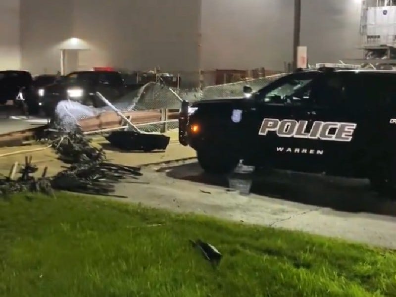 Warren police car at the scene of Warren Stamping Plant break-in