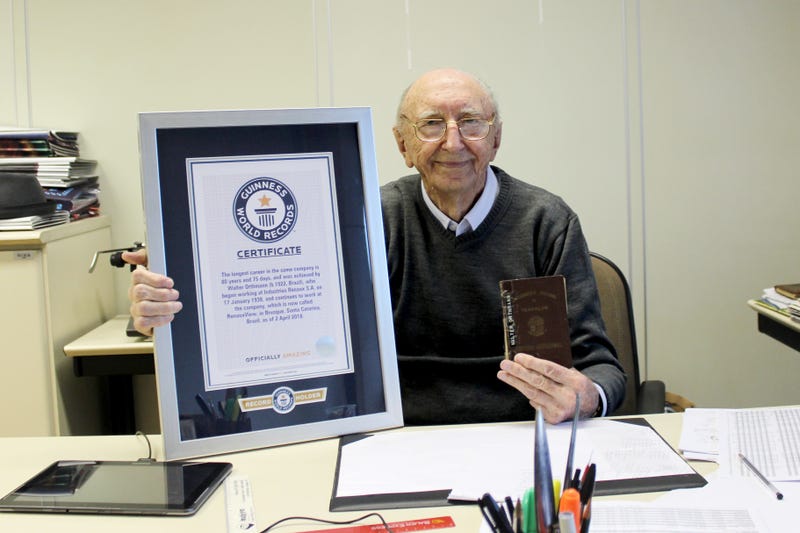 Walter Orthmann holding his World Record certificate. 