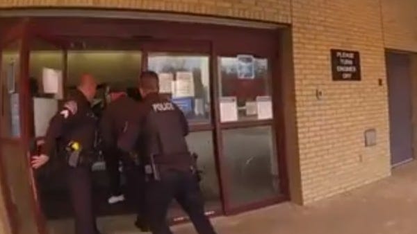 Warren police release 'emotional' video of officers rushing non-breathing 4-month-old to the hospital in squad car