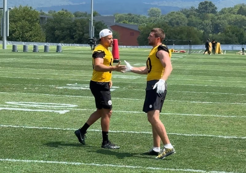Alex Highsmith and TJ Watt slapping hands