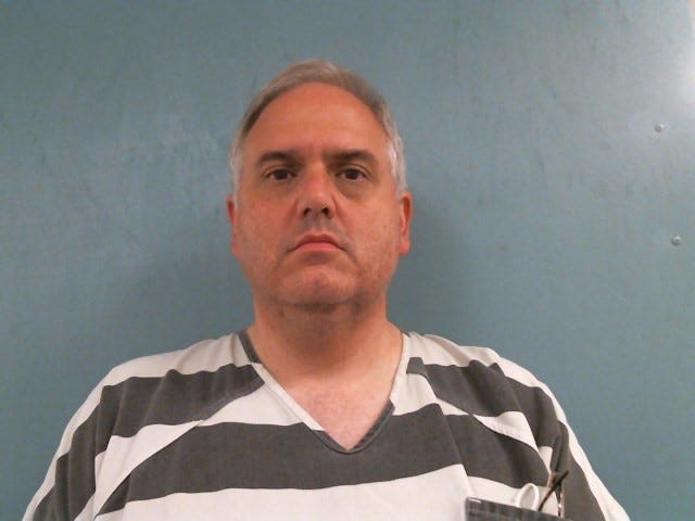 Embattled priest facing molestation charges