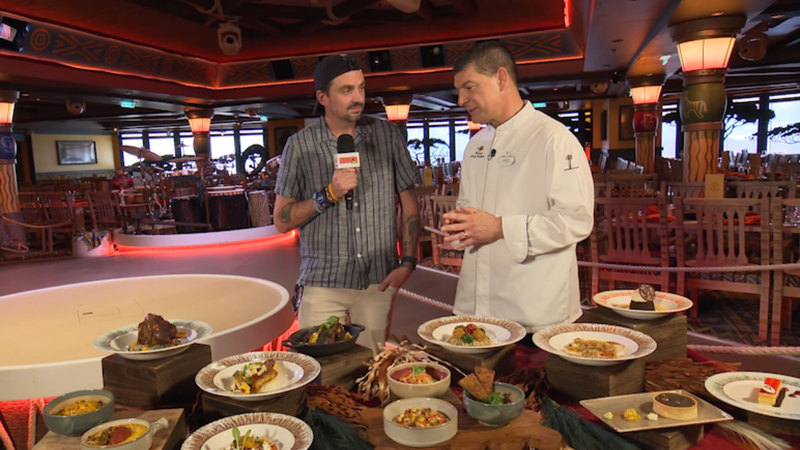 Coop chats food with Chef Andy and entertainment with Paul at Pride Lands: Feast of The Lion King on Disney Destiny