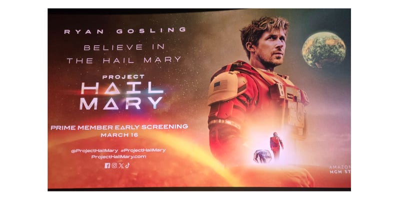 A giant theatre screen with Project Hail Mary early screening displayed