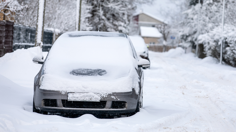 Snow covered car