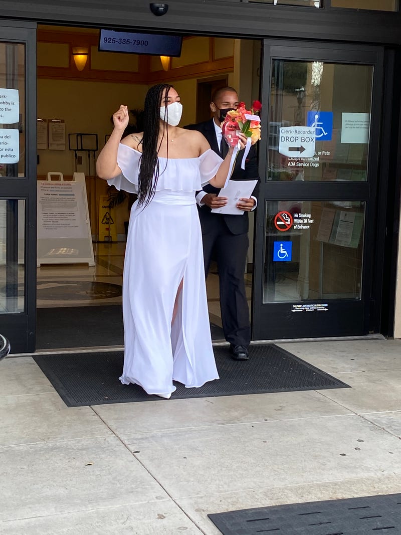 A lucky couple steps outside after getting married this Valentine's Day, despite the COVID-19 pandemic