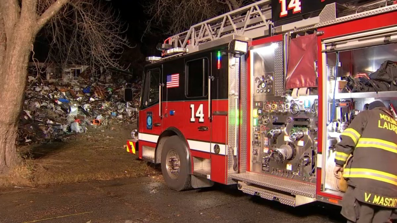 Fire crews respond to a house fire in Westampton Township, New Jersey, that left one person dead on Saturday, Dec. 7, 2024.