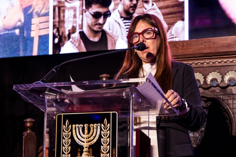 Ayelet Samerano, whose son Jonathan was killed by an UNWRA employee on Oct. 7 and his body was taken to Gaza in an UNWRA vehicle, speaks at the Oct. 7 commemoration ceremony "From Darkness to Light We Stay United" at Park East Synagogue in Manhattan on Oct. 28, 2024.