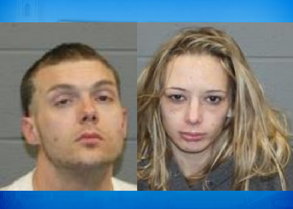 One arrested for alleged bank robbery, the other for drug possession