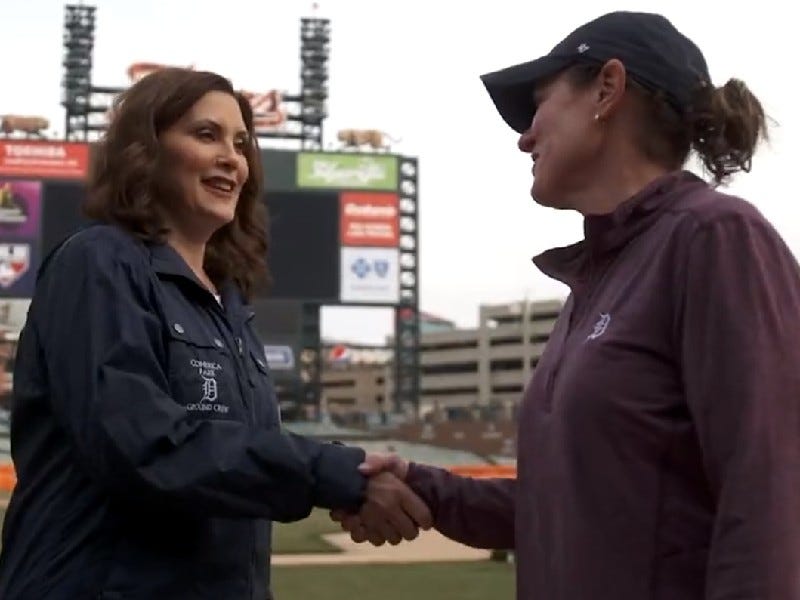 Gov. Gretchen Whitmer and Tigers head groundskeeper Heather Nabozny
