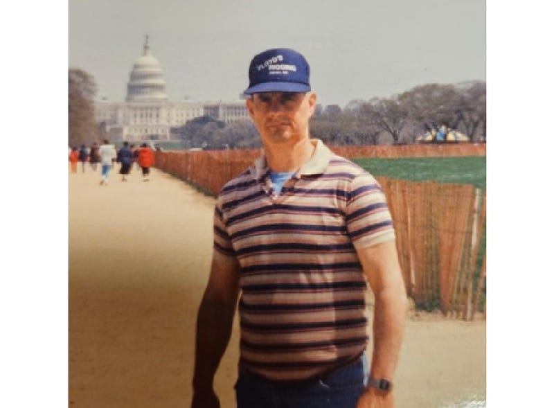 Man in front of Capitol Building