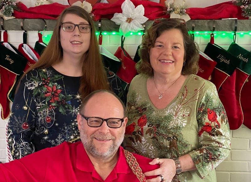 Lexi Yeatts (left) and her parents, Tony and Sandy Wilson.