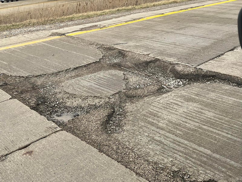 Drivers beware: a behemoth pothole has opened quite a crater on the northbound I-75 exit ramp to eastbound West Road in Wayne County, police said on Friday.