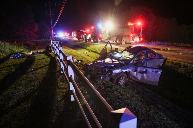 crashed car off the road