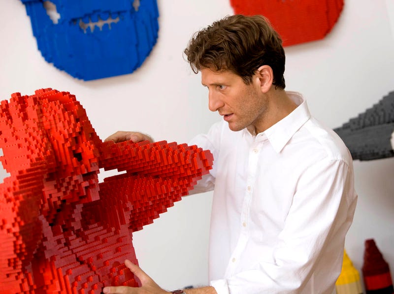 Artist Nathan Sawaya working in his studio.