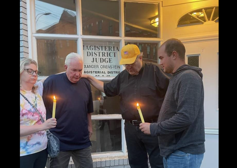 Protesters outside of Judge Xander Orenstein's office