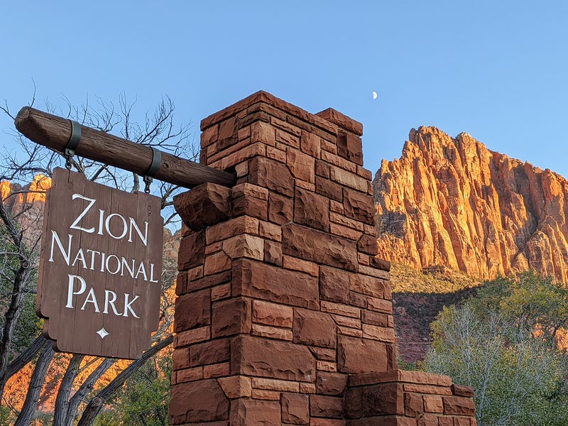 A sign welcomes all into Zion National Park