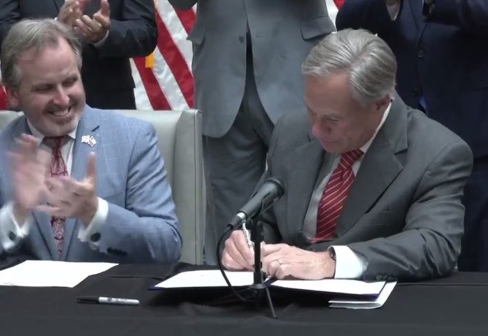 Governor signs election bill into law, says he anticipated legal challenges