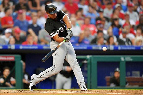 White Sox 1B Jose Abreu swings at a pitch against the Phillies. 