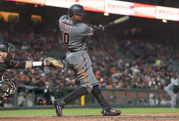 Adam Jones rips a base hit for the Diamondbacks in an August game. 