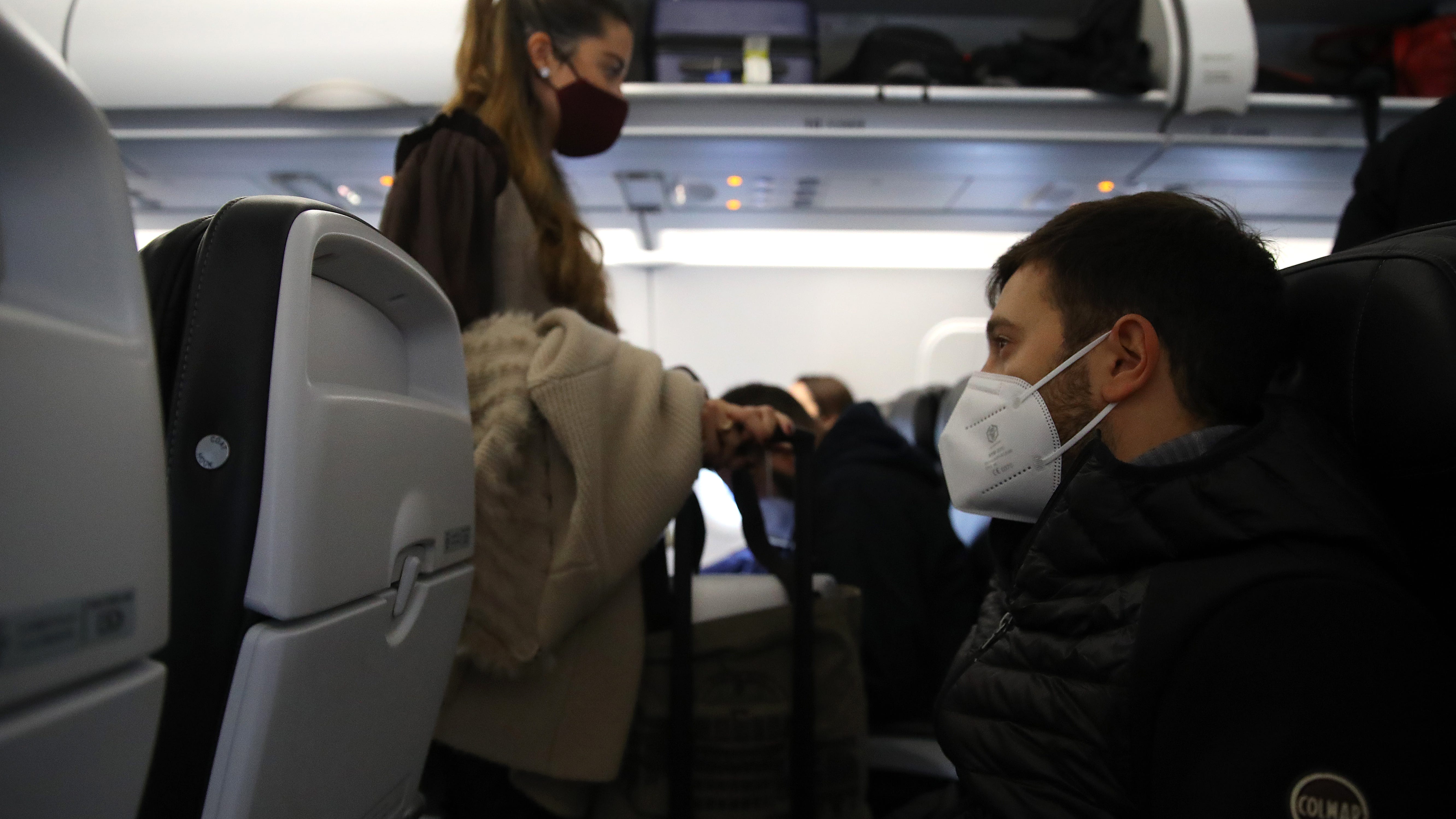 Is it safe to sit in the middle seat on an airplane?