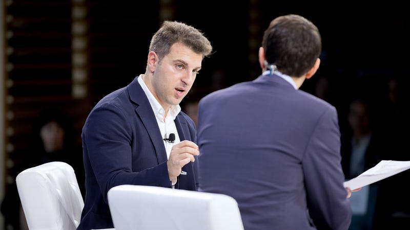 Airbnb CEO Brian Chesky speaks at the New York Times DealBook conference