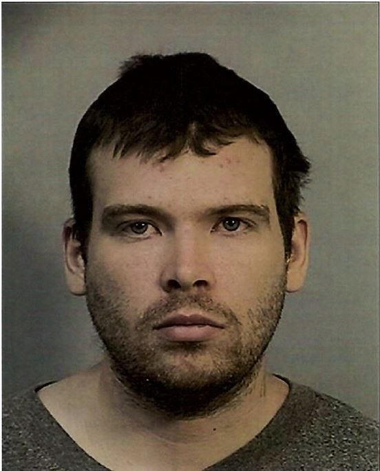 John Lee Cowell, 27, seen here in an earlier mug shot, is wanted for allegedly stabbing two women at the MacArthur BART station.