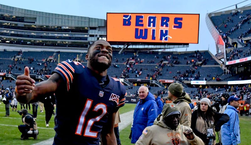 Bears receiver Allen Robinson (12) celebrates after his team's win against the Lions.