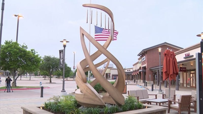 A memorial erected Monday, May 6, 2024 at the Allen Premium Outlets in honor of the victims of the mass shooting a year ago.