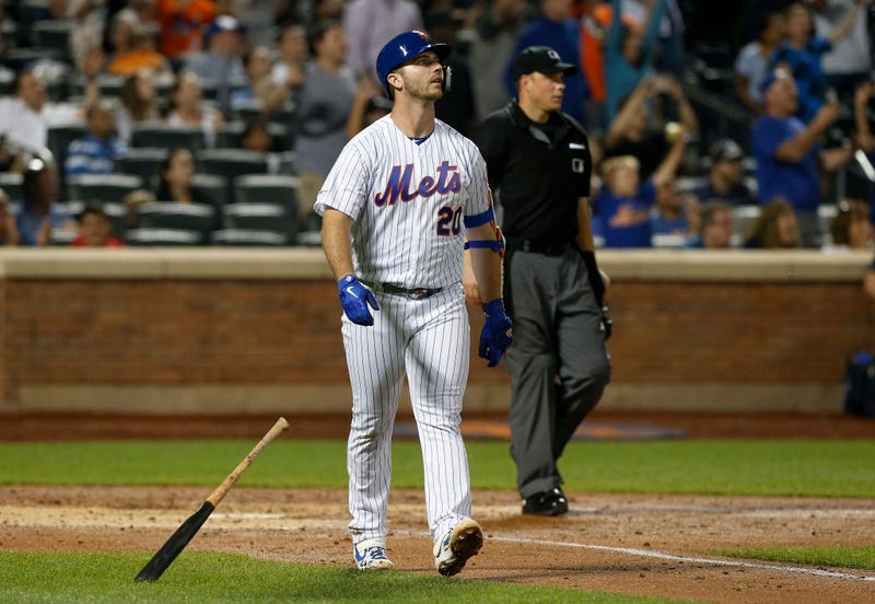 Pete Alonso struts down first base after belting a home run. 