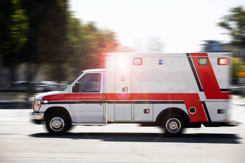 Blurred motion action view of an ambulance responding to the scene of an emergency