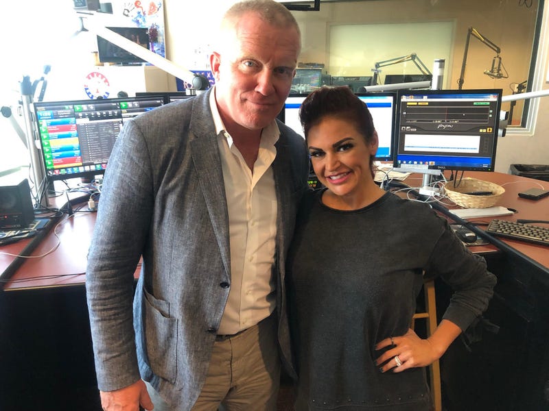 Anthony Michael Hall and Sybil in the 98.7 KLUV studio
