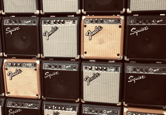 stack of small Fender and Squier amps