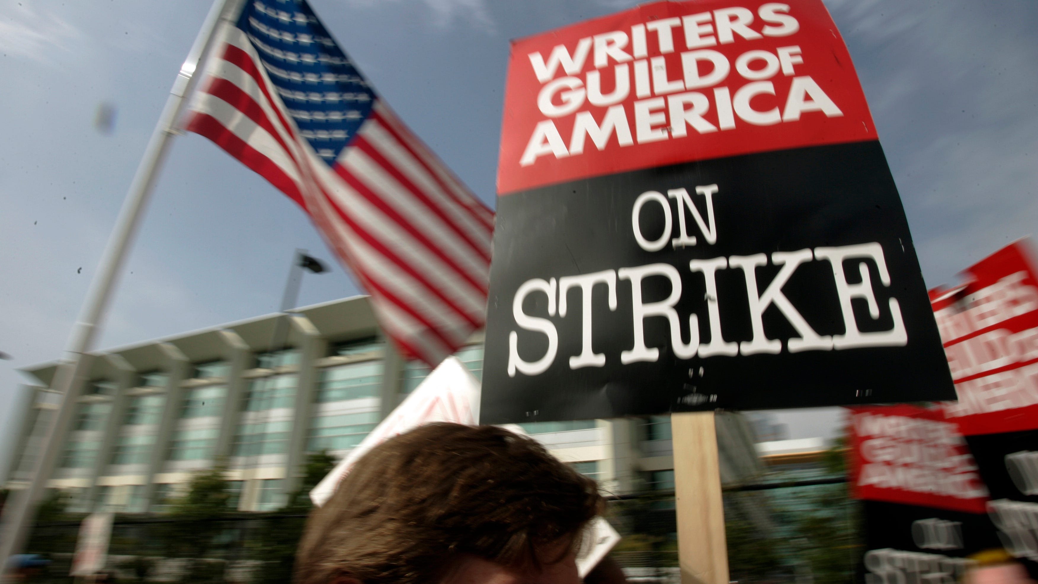 Hollywood writers begin strike, late-night shows go dark