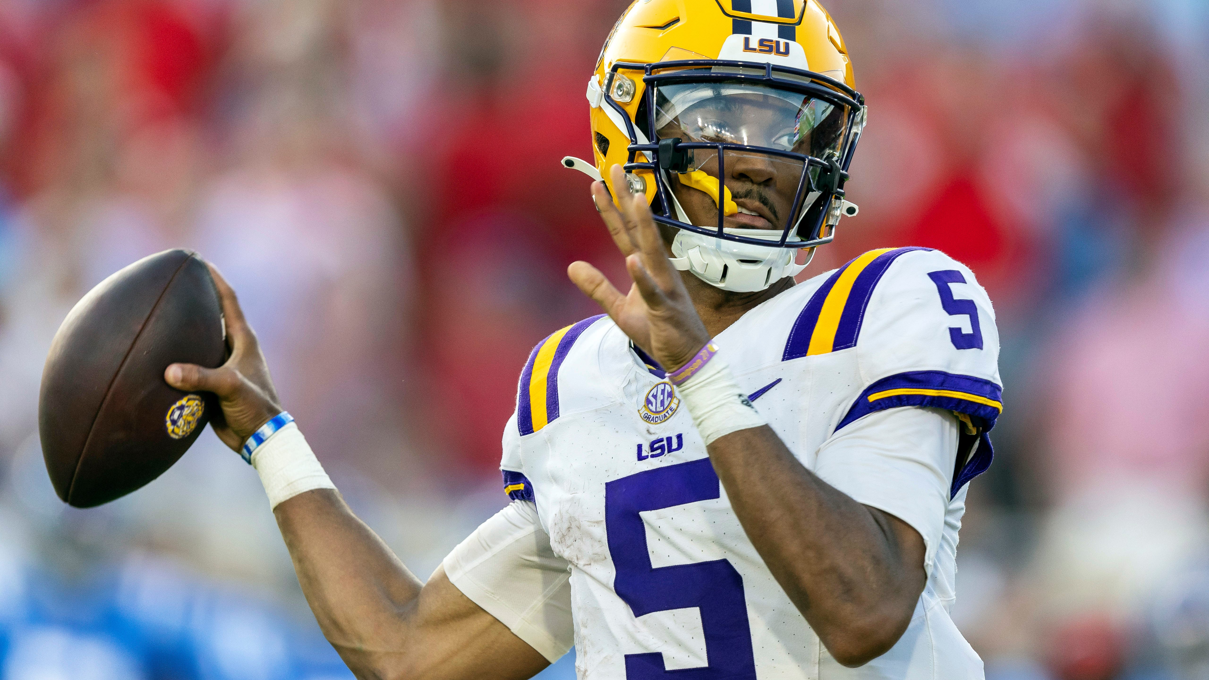 Jayden Daniels, the dazzling quarterback for LSU, is the AP college football player of the year