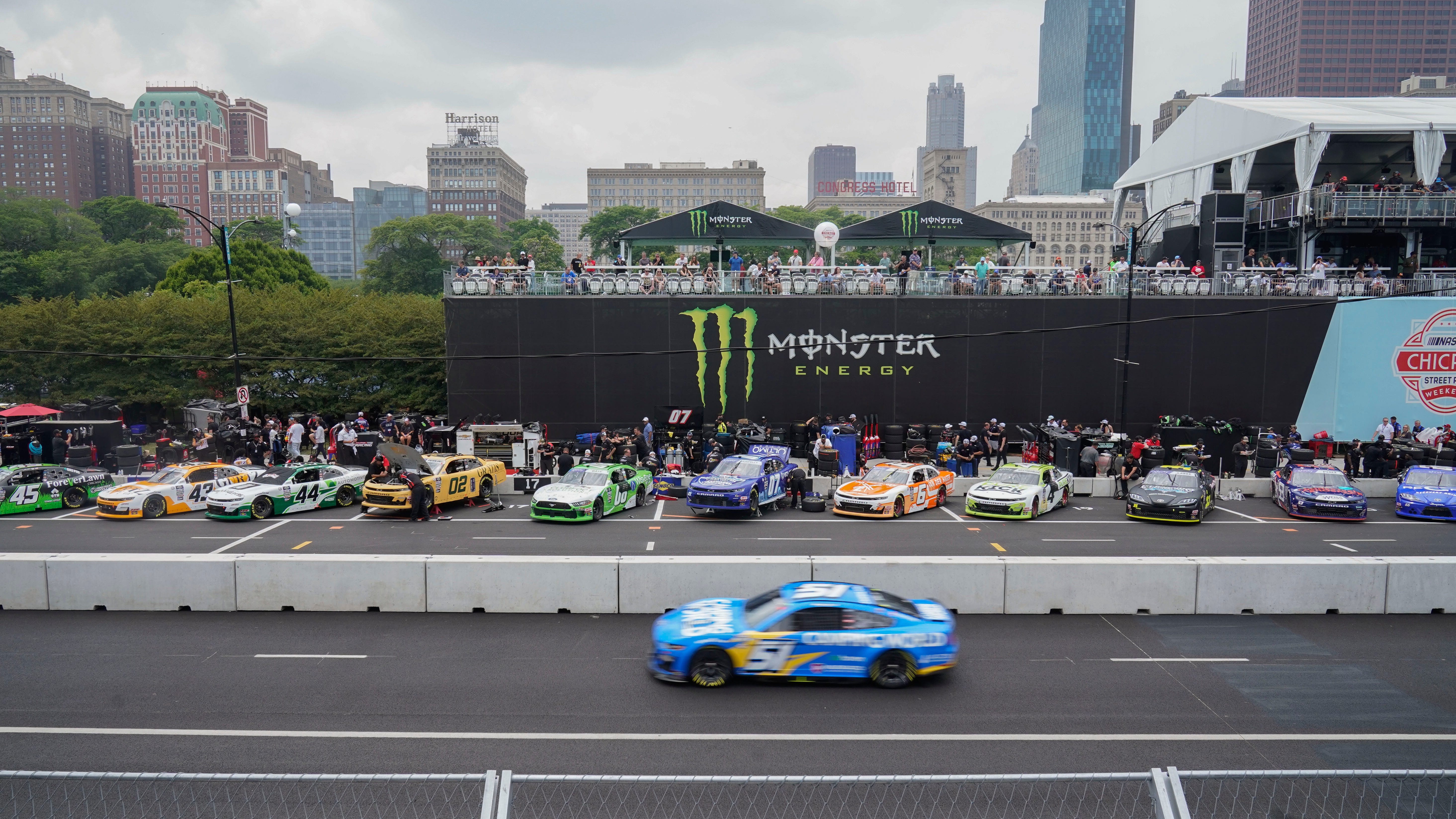 Heavy rains flood Chicago roads and force NASCAR to cut short a downtown street race