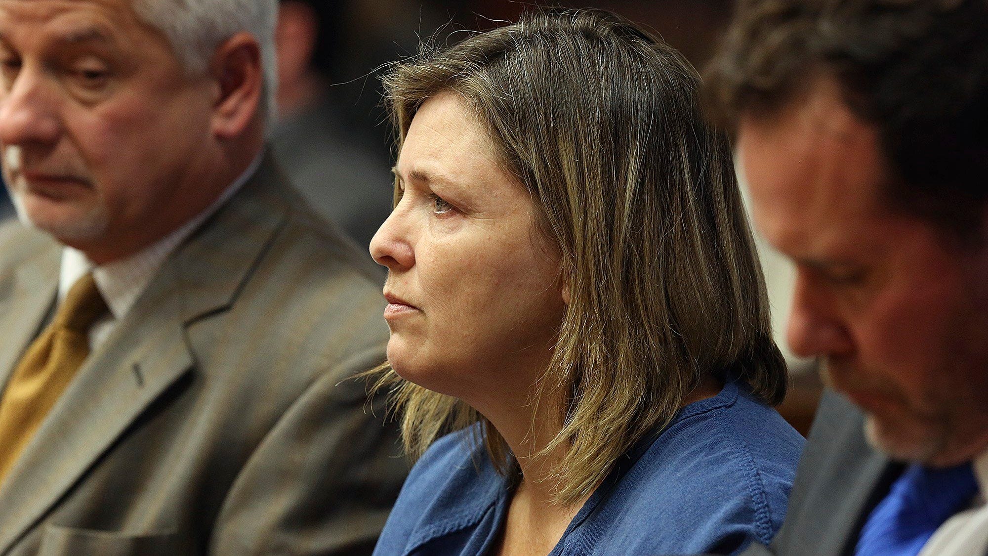 Woman is 2nd to admit role in death of 8 members of a family