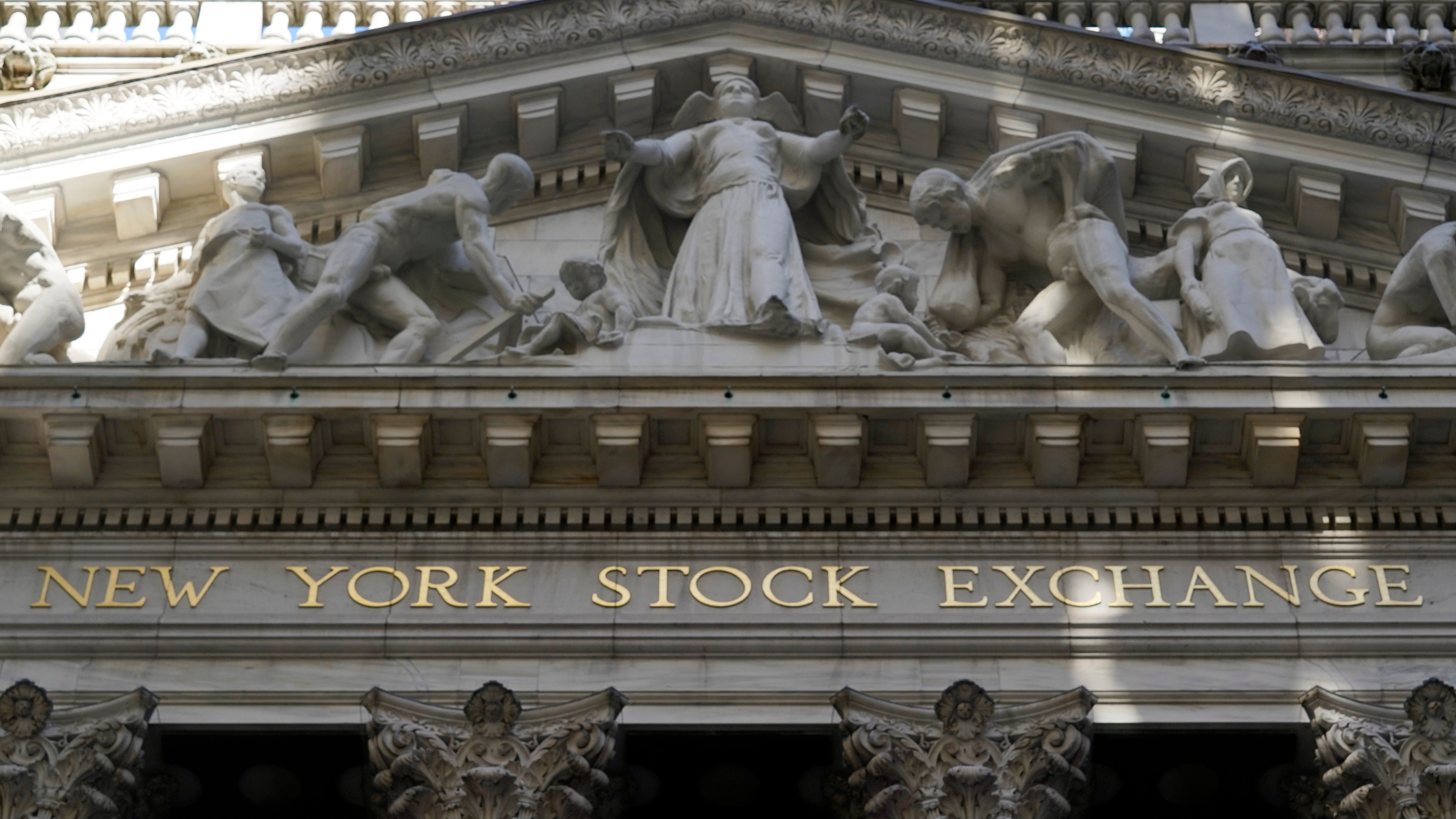 Stocks lower after Kabul bombing; traders also wait for Fed