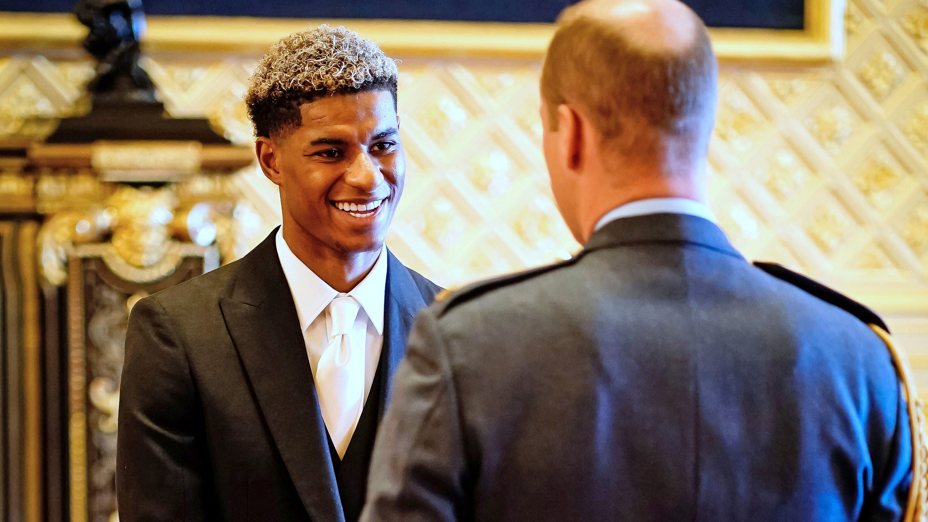 Soccer star Rashford honored for fighting child poverty