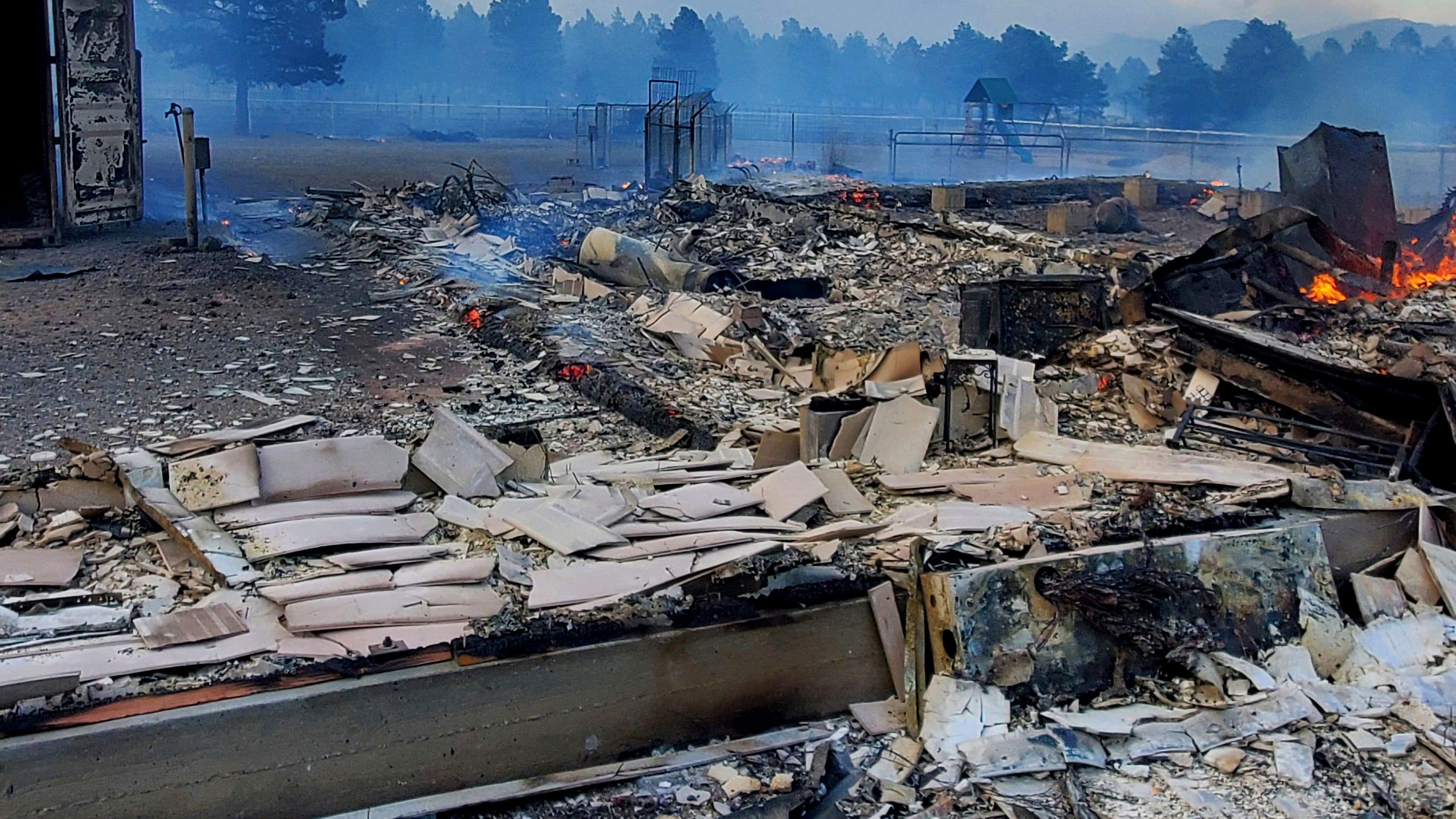Southwest wildfires force evacuations, tighten resources
