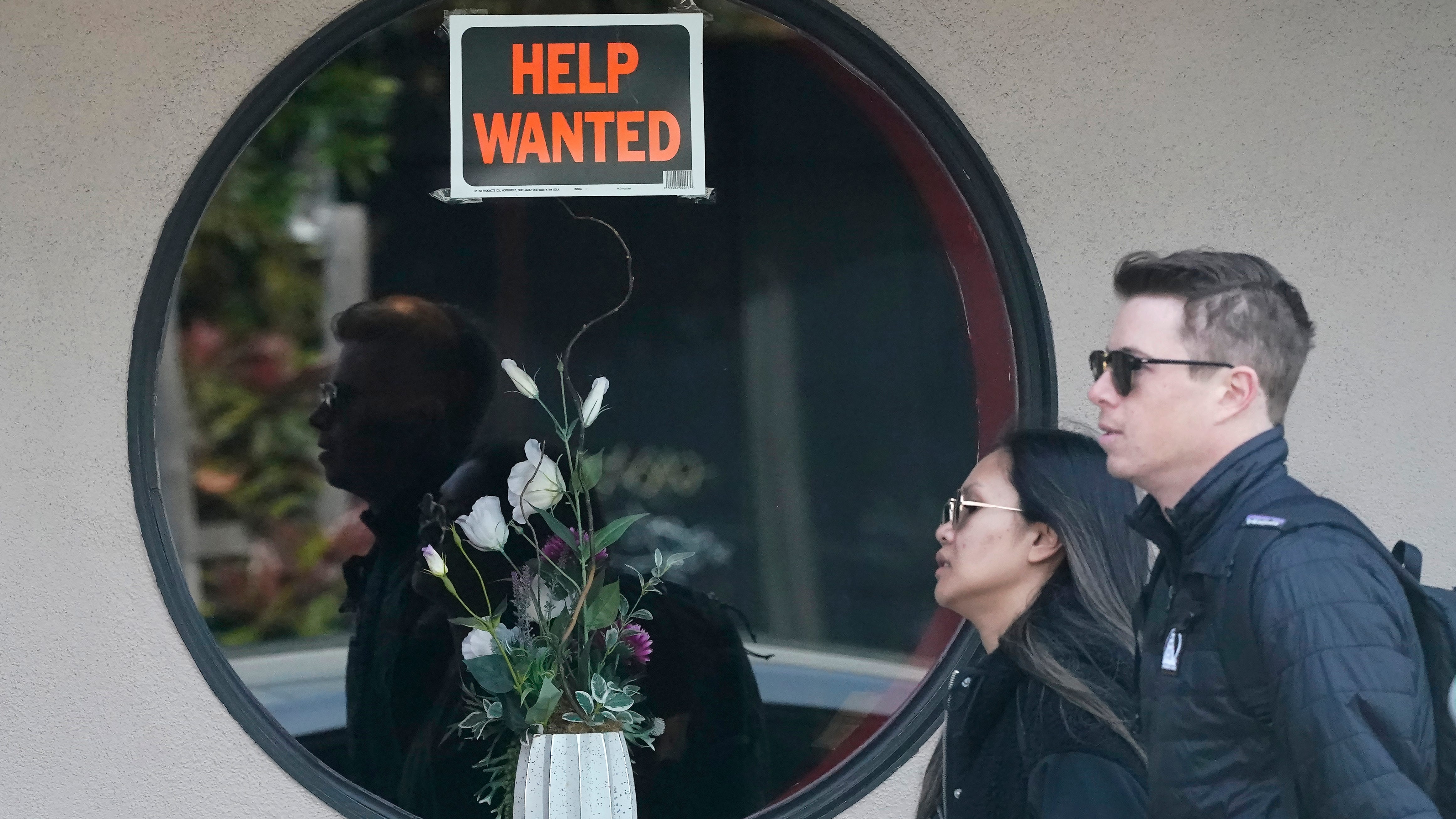 US unemployment claims tick up to 245,000, but still low