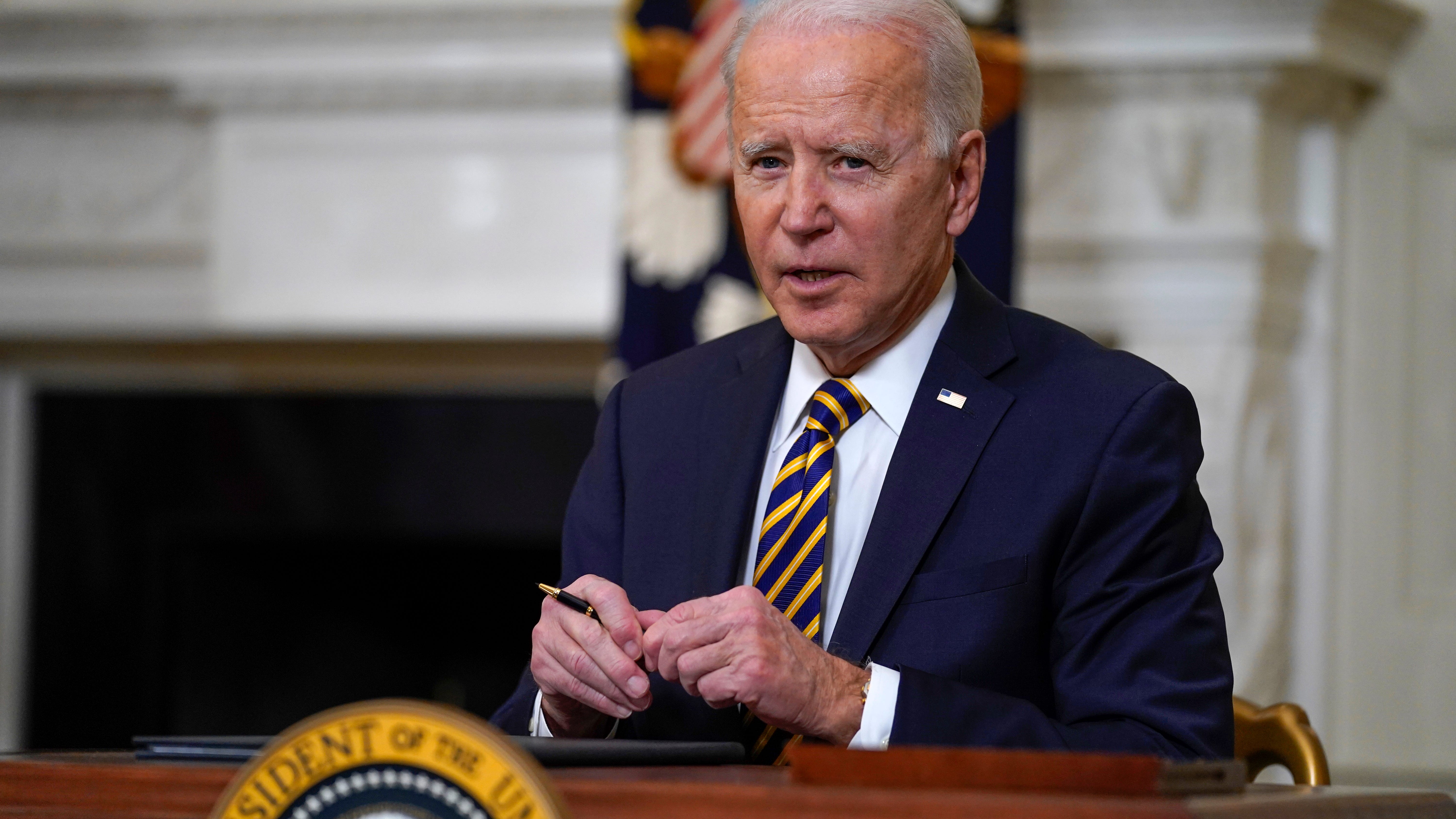 Biden signs $15 minimum wage for federal contract workers