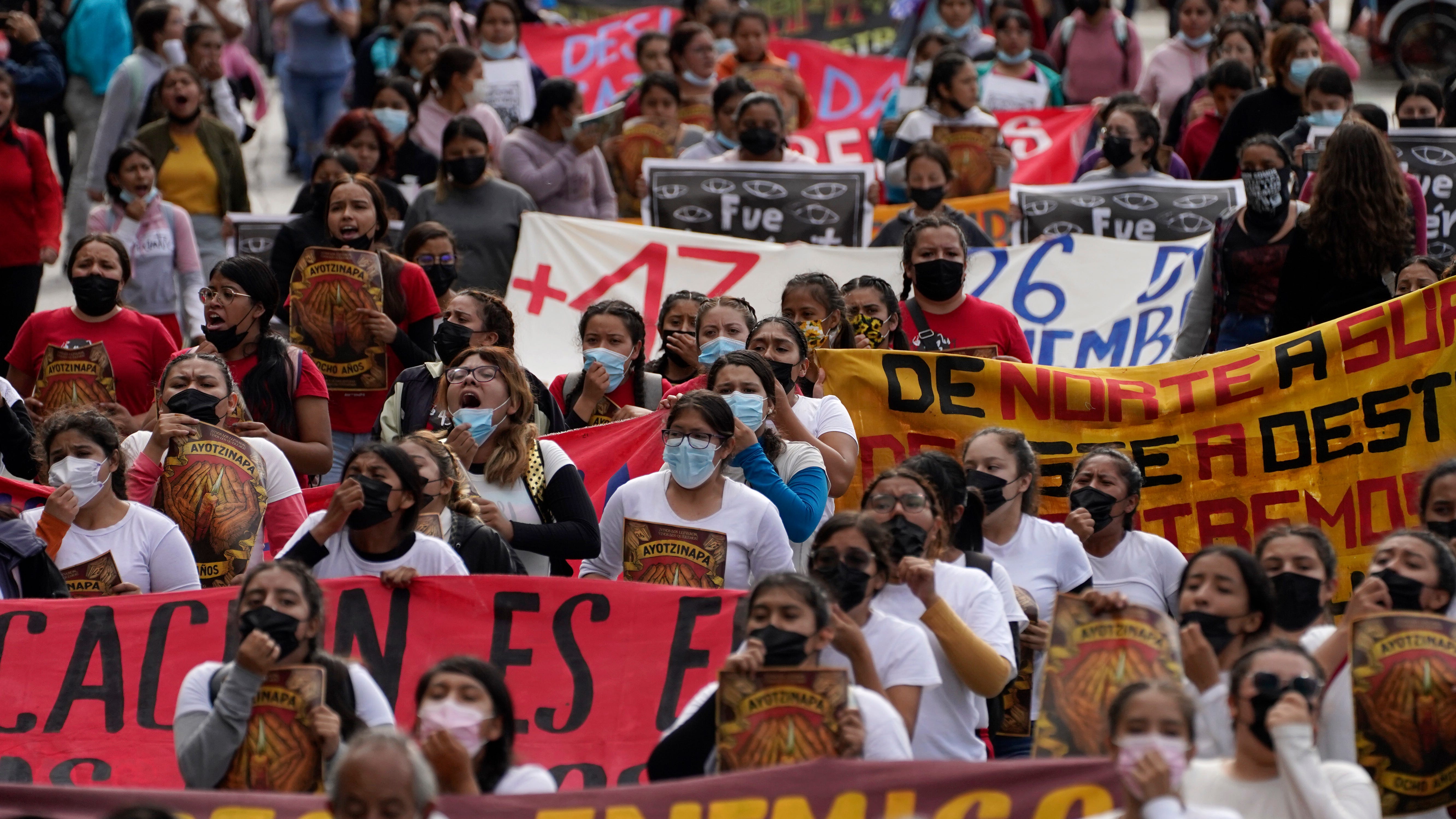 Families of Mexico's missing students march on anniversary