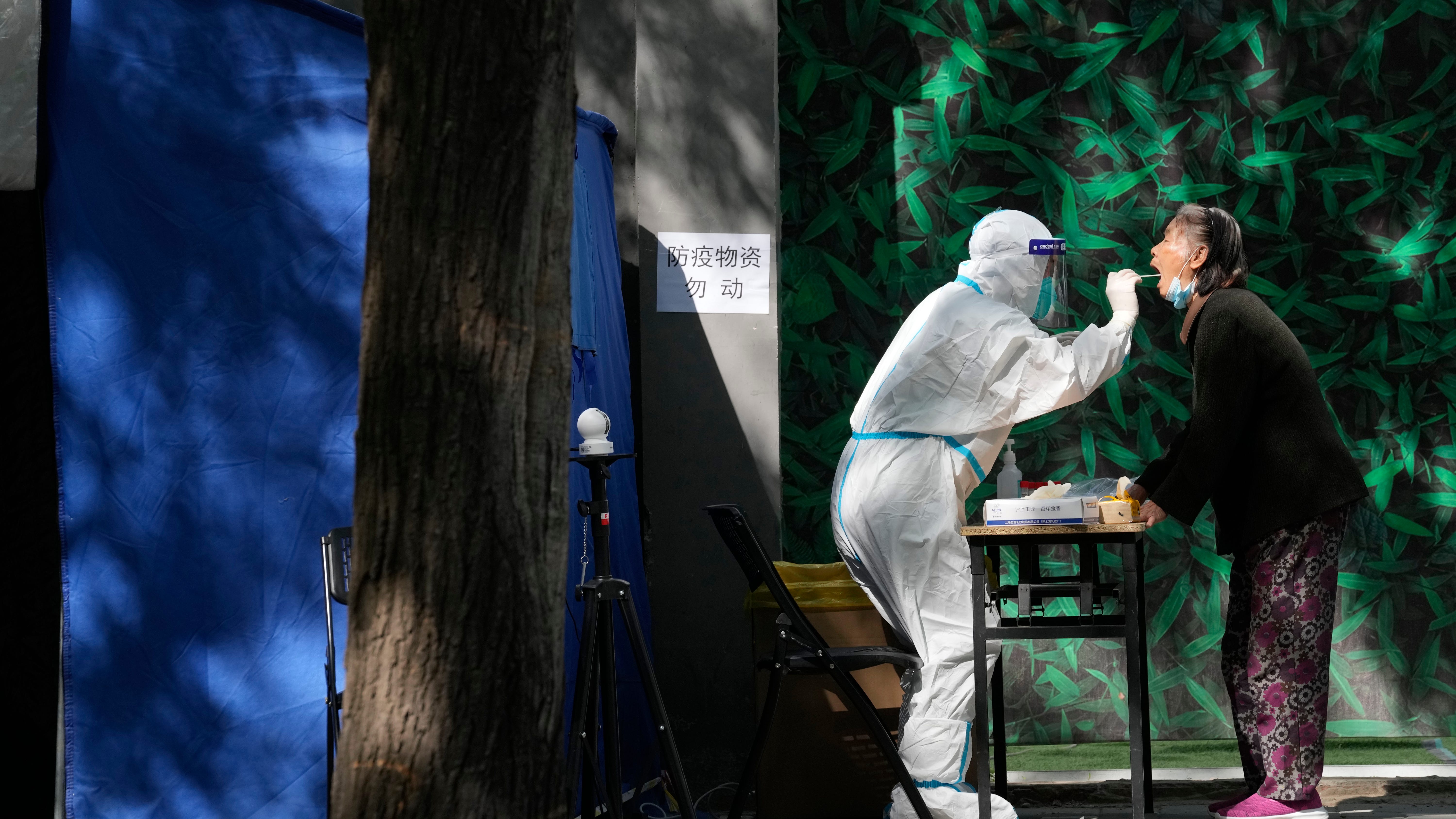 Beijing preps COVID-19 hospital spaces, though new cases low
