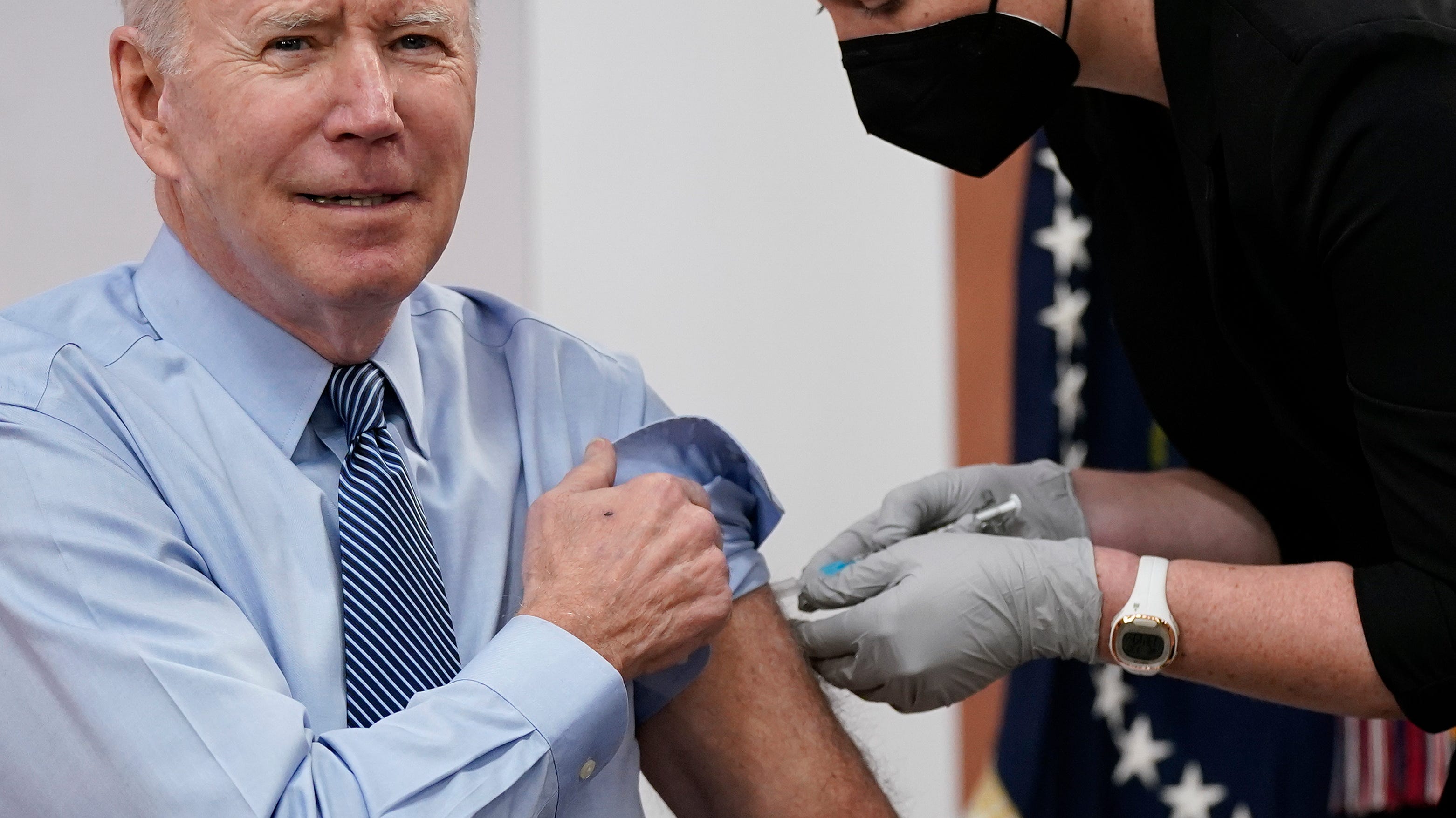 Biden receives 2nd booster, presses Congress on virus funds