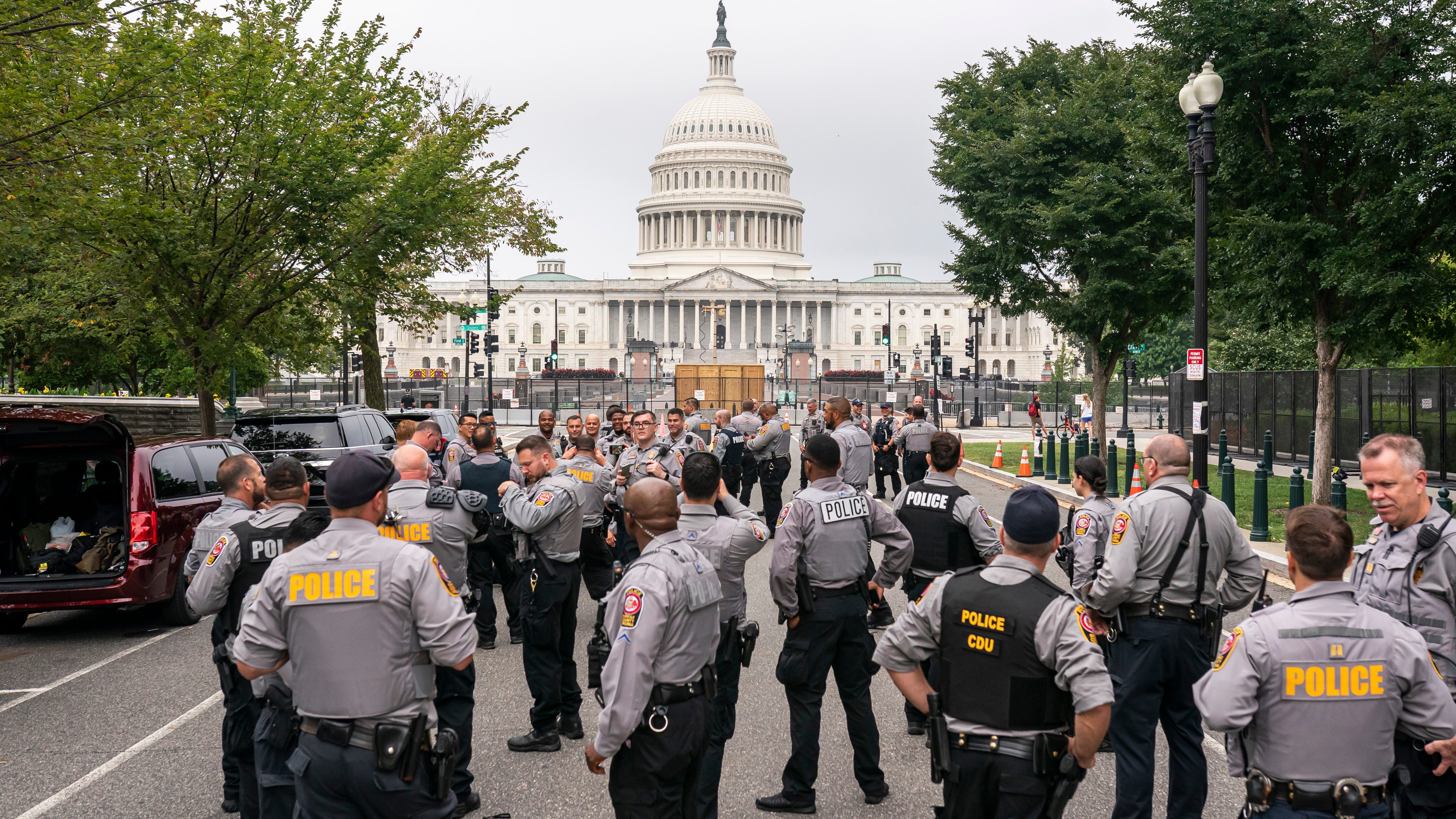 Heavy police presence as protesters trickle in for DC rally